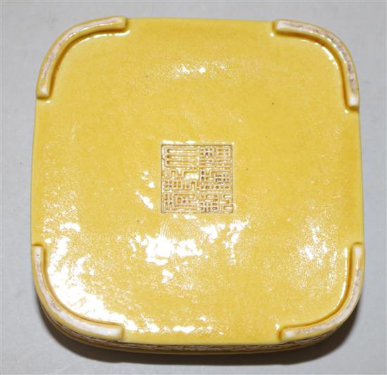 A Chinese moulded and yellow glazed box and cover, Qianlong mark, probably Republic period, 6.7cm